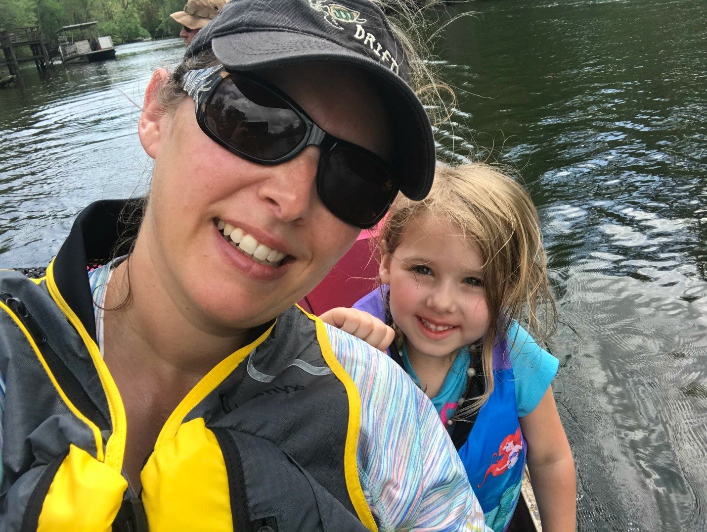 Amanda Nalley and her daughter sport lifejackets to ensure the 5-year-old’s safety.